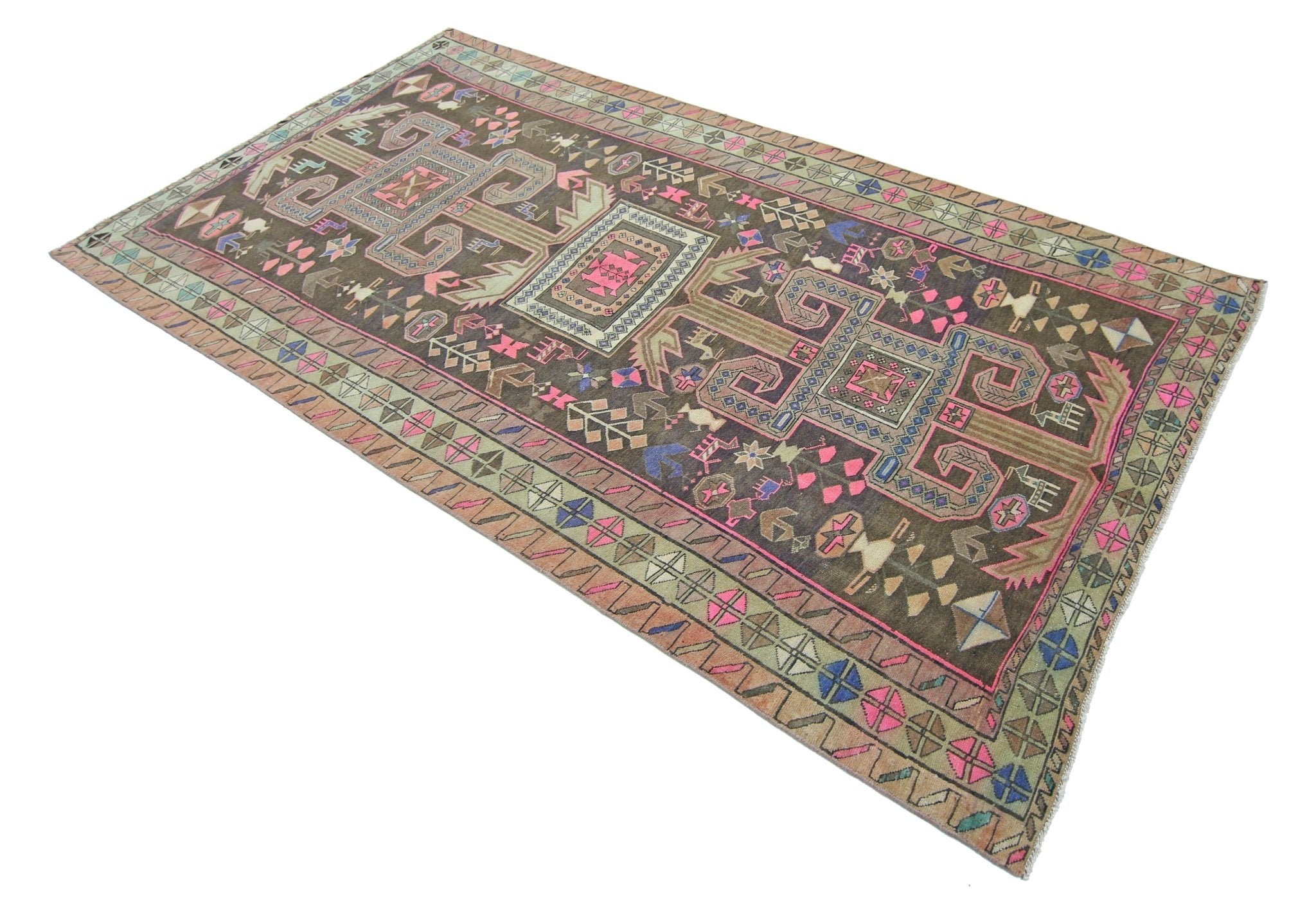 A vintage handmade Persian Ardabil rug featuring geometric patterns in a dark, colorful palette.
