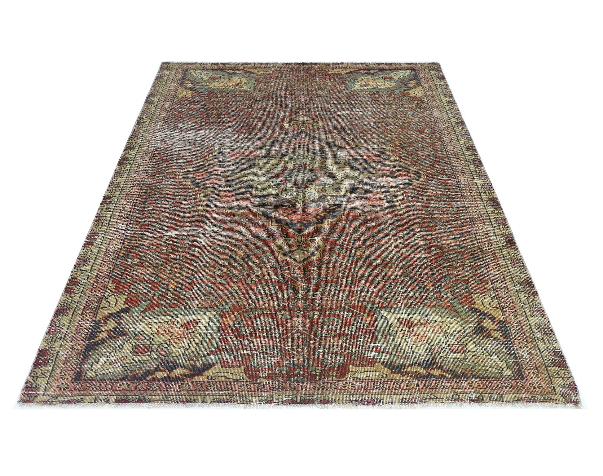A vintage handmade Persian Bakhtiari rug featuring a traditional floral medallion in muted tones.