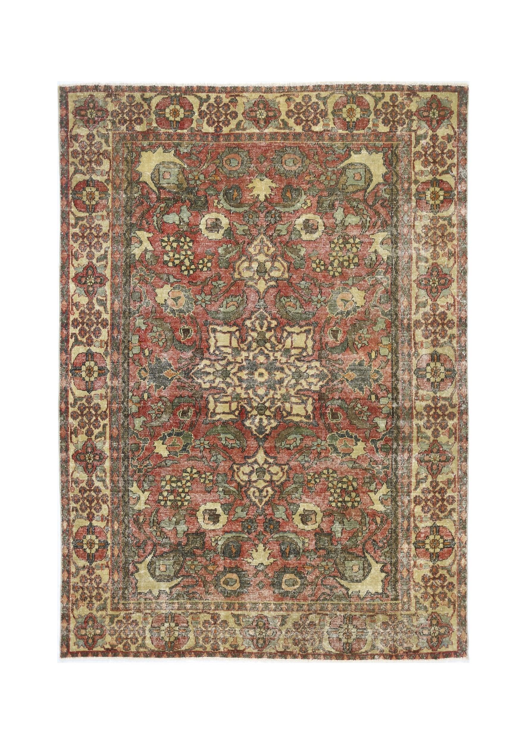 A vintage handmade Persian Bakhtiari rug featuring a floral medallion pattern in red and green.