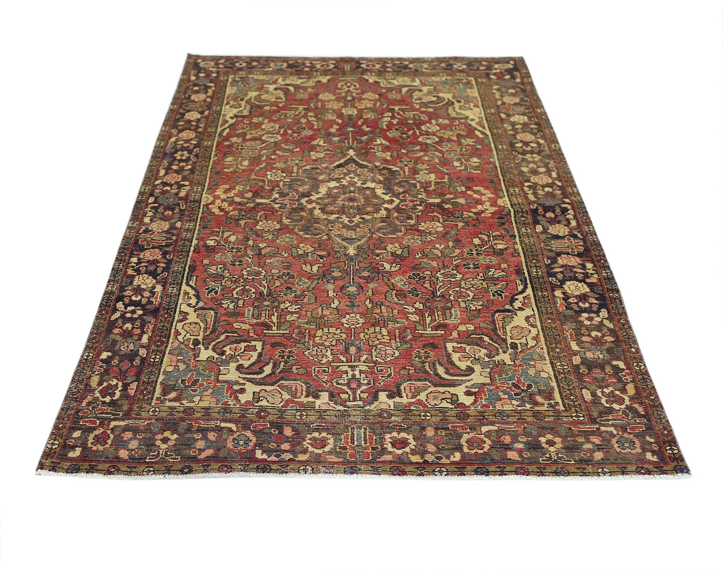 A vintage handmade Persian Bakhtiari rug featuring a floral pattern in red, blue, and cream tones.