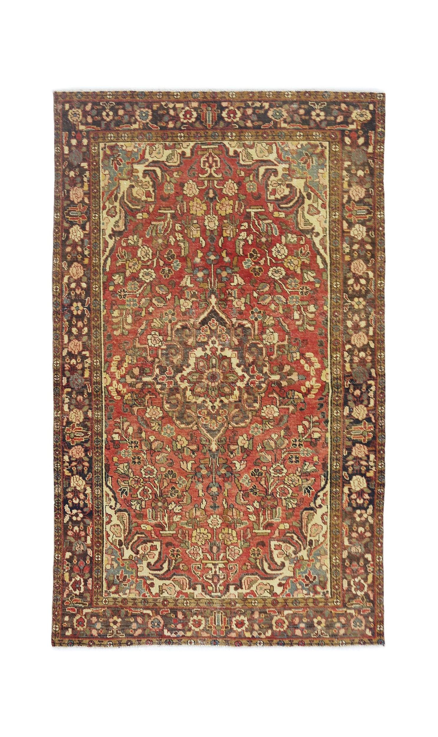 A vintage Persian Bakhtiari rug featuring a central floral medallion on a red field.