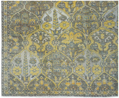 A vintage Persian Bakhtiari rug featuring a repeating geometric garden pattern in yellow and grey.