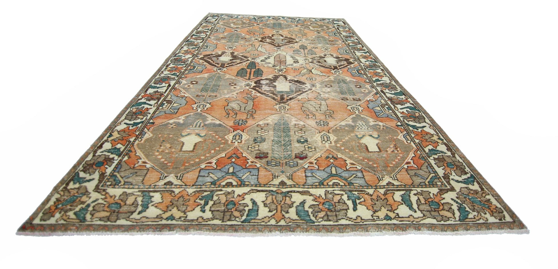A vintage Persian Bakhtiari rug featuring a geometric diamond pattern with animal and floral motifs.