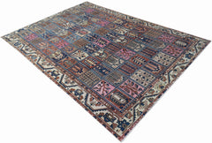 A vintage Persian Bakhtiari rug featuring a handwoven grid of colorful geometric floral motifs.