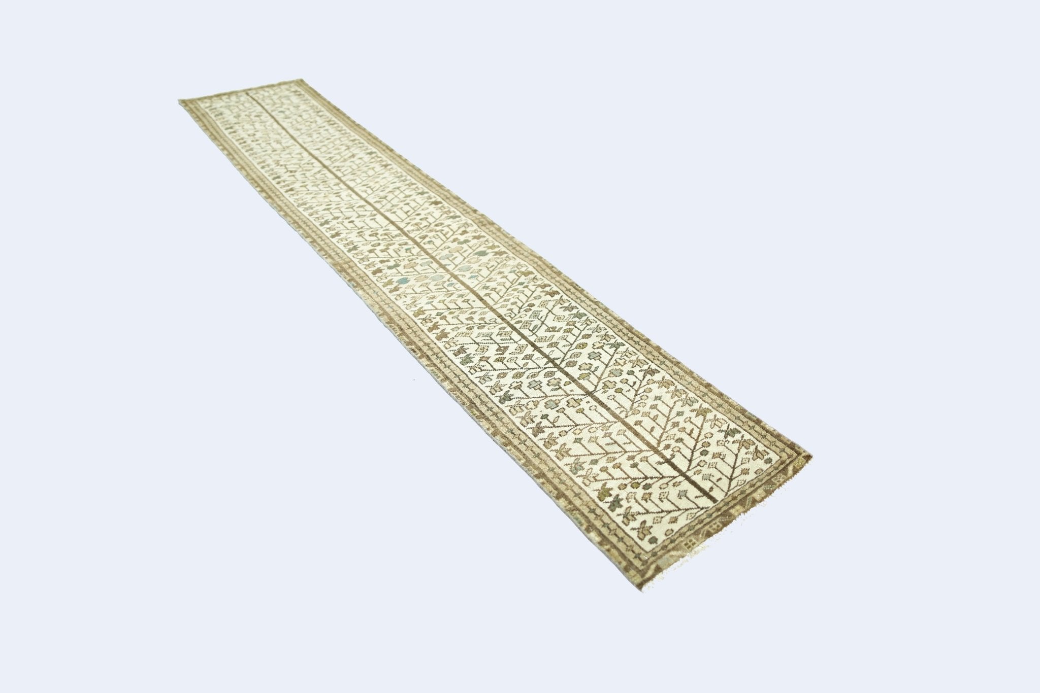 A vintage Persian Bakhtiari runner rug featuring a repeating tree of life pattern in neutral tones.