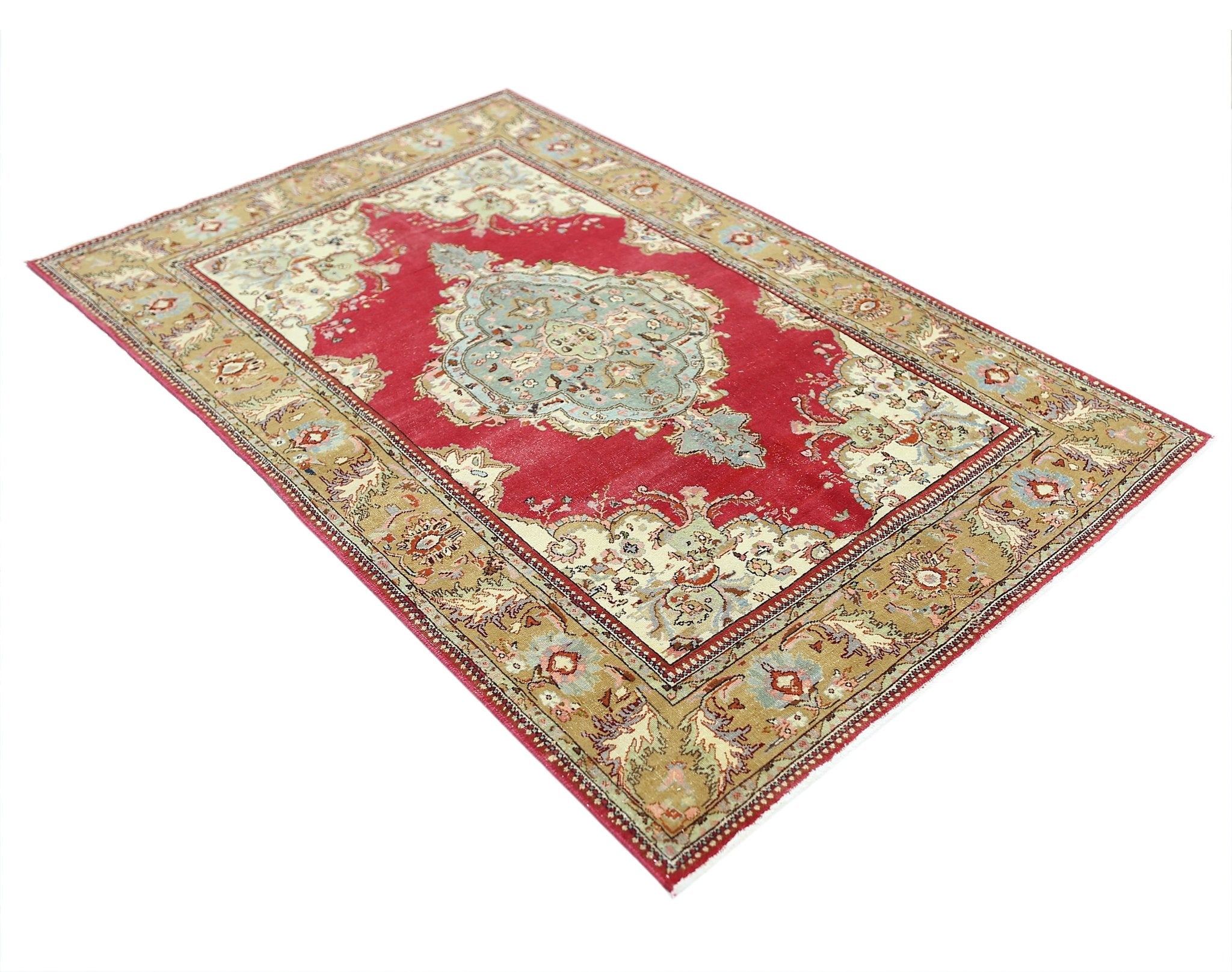 A vintage Persian Bidjar rug featuring a central medallion on a red field with floral borders.