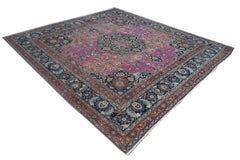 A square vintage Persian Bidjar rug featuring a central medallion on a vibrant pink and blue field.