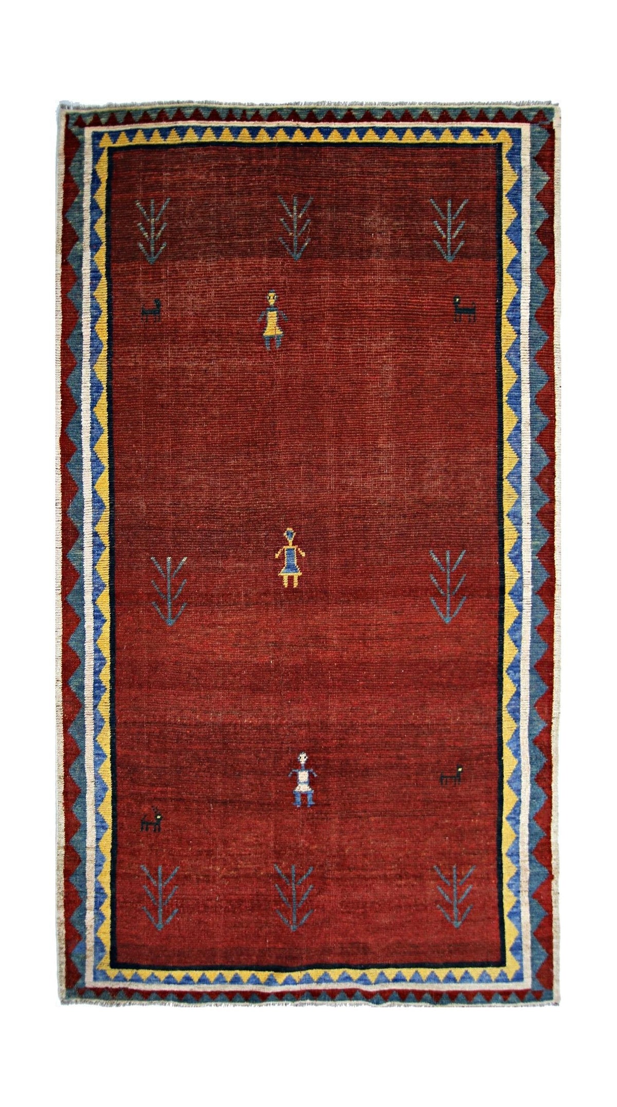 Vintage Persian Gabbeh rug in deep red with blue and yellow geometric borders, featuring stylized figures and tree motifs.