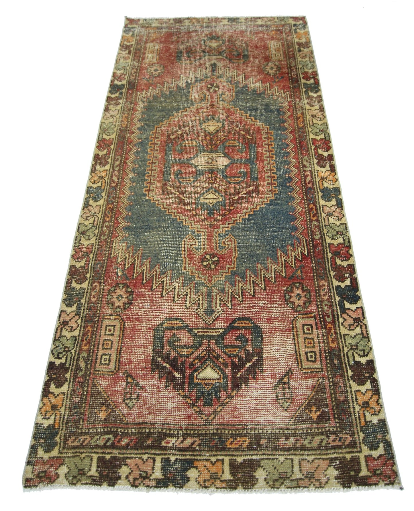 A vintage handmade Persian Hamadan rug featuring a geometric medallion pattern in red and blue.