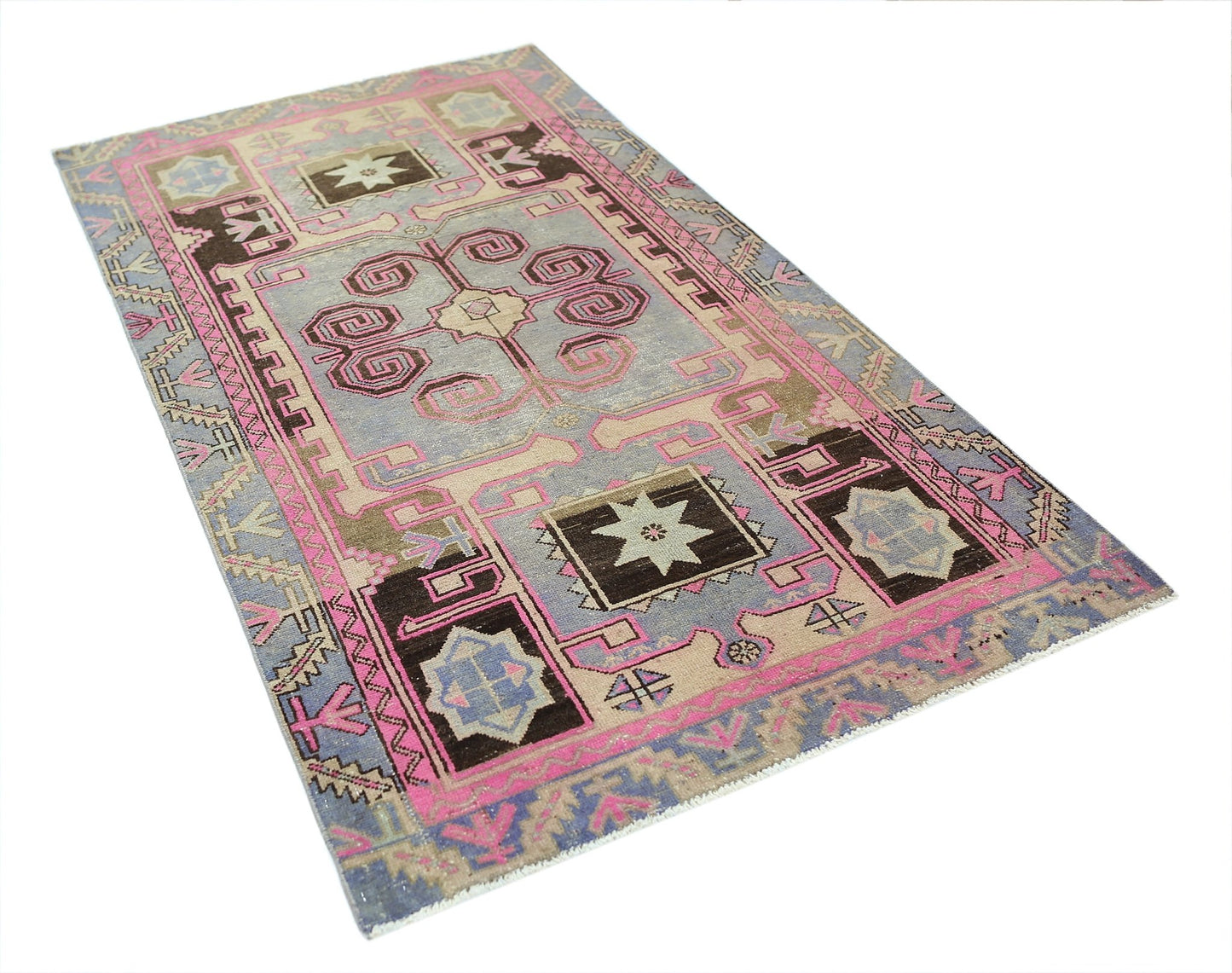 A vintage Persian Hamadan rug featuring geometric patterns in shades of pink, blue, and brown.