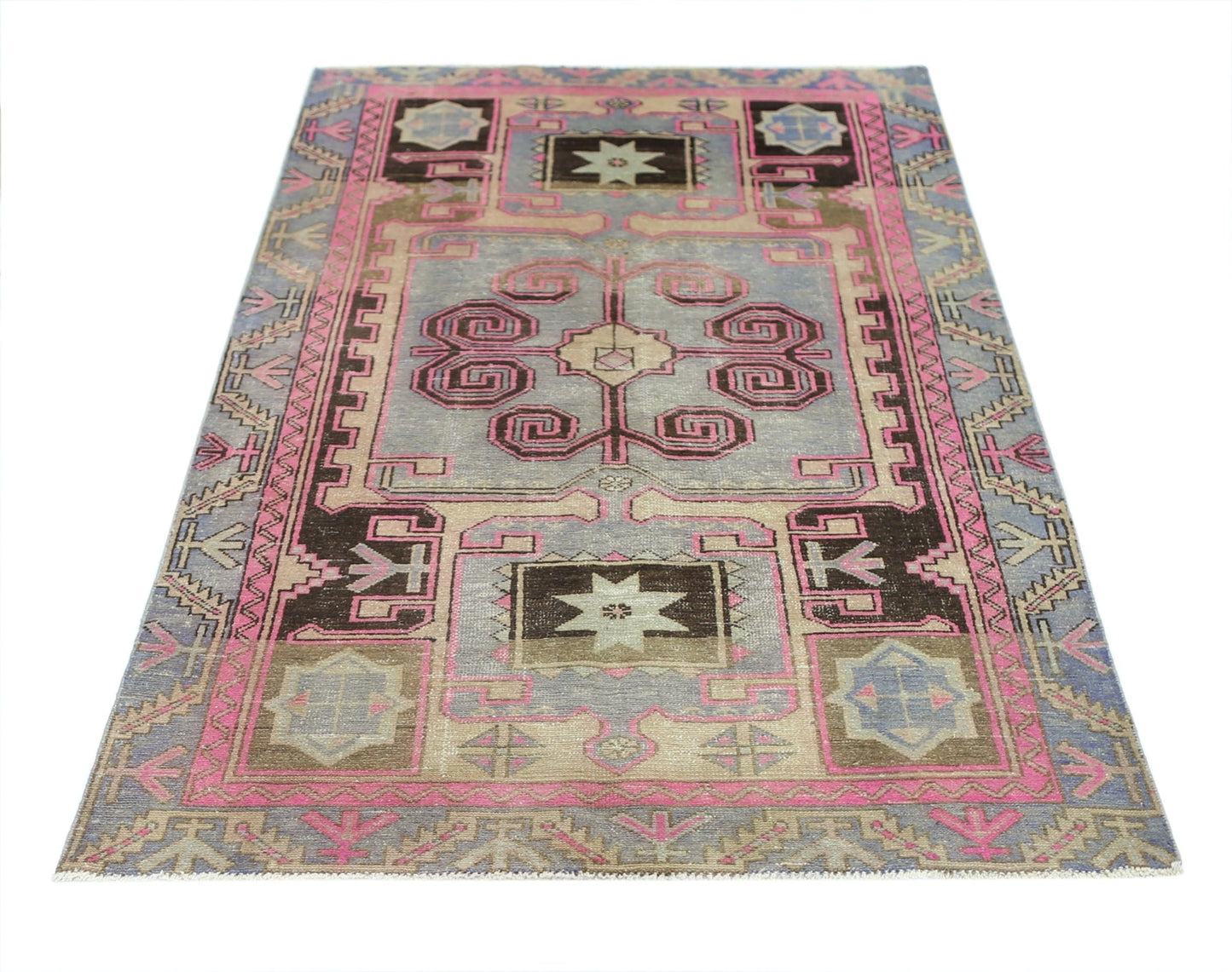 A vintage Persian Hamadan rug featuring geometric patterns in shades of pink, grey, and brown.