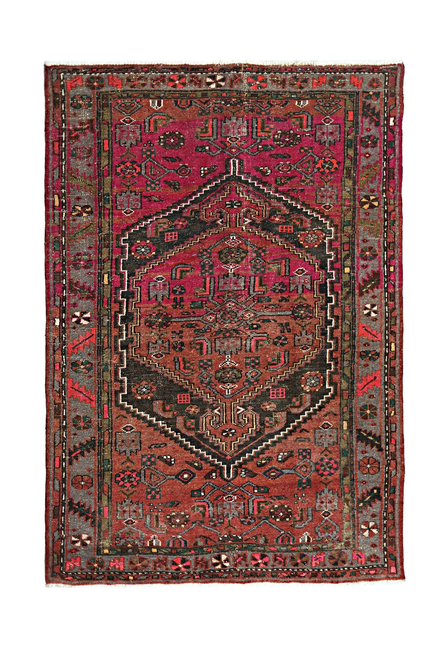 A vintage handmade Persian Hamadan rug featuring a central geometric medallion in red and black.