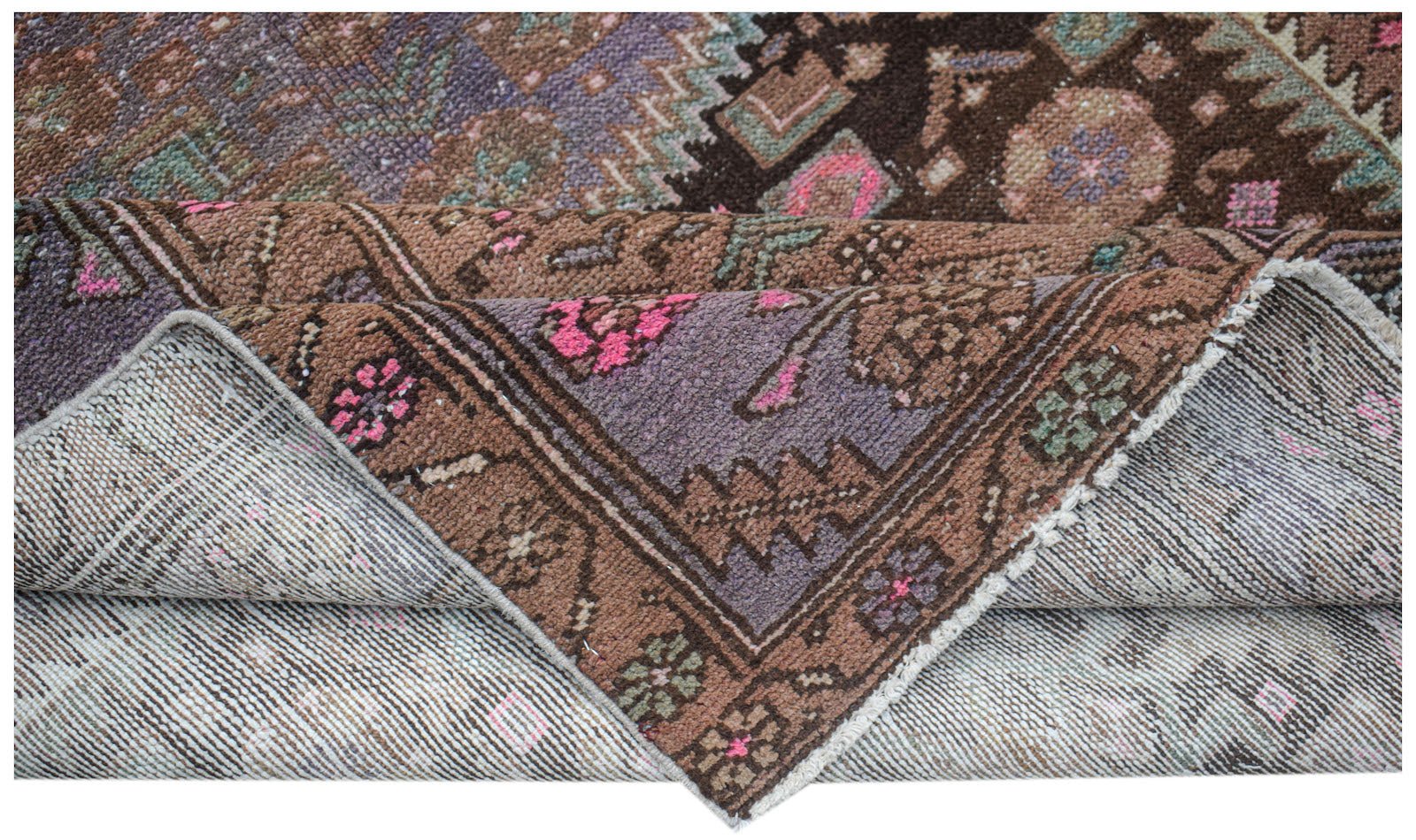 Vintage Persian Hamadan rug with brown, purple, and pink geometric patterns.