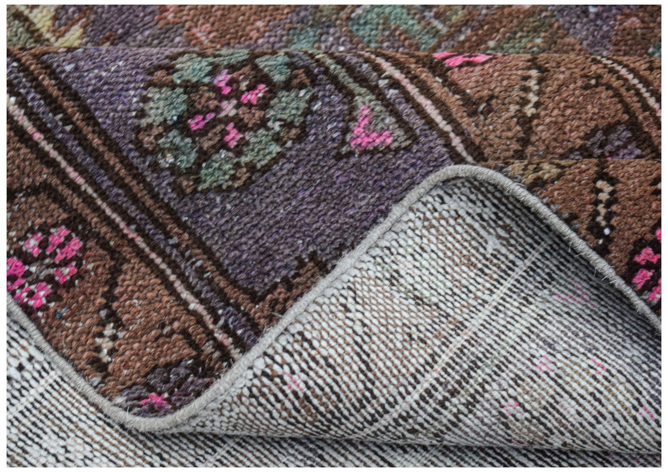 Vintage Persian Hamadan rug with a brown, purple, and pink floral pattern.