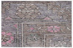 Vintage Persian Hamadan rug with a striped pattern and pink floral accents.