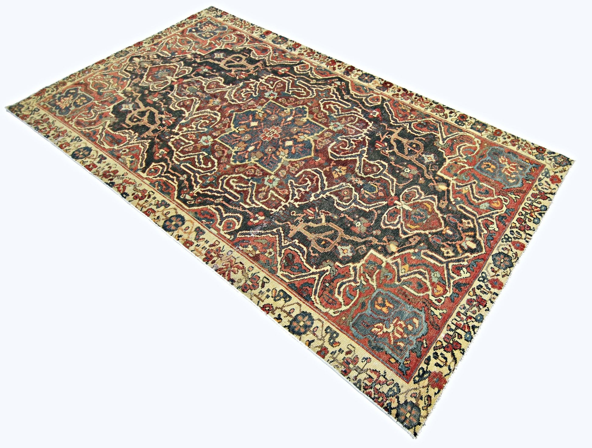 A rectangular vintage Persian rug featuring an intricate floral pattern in red, blue, and cream.