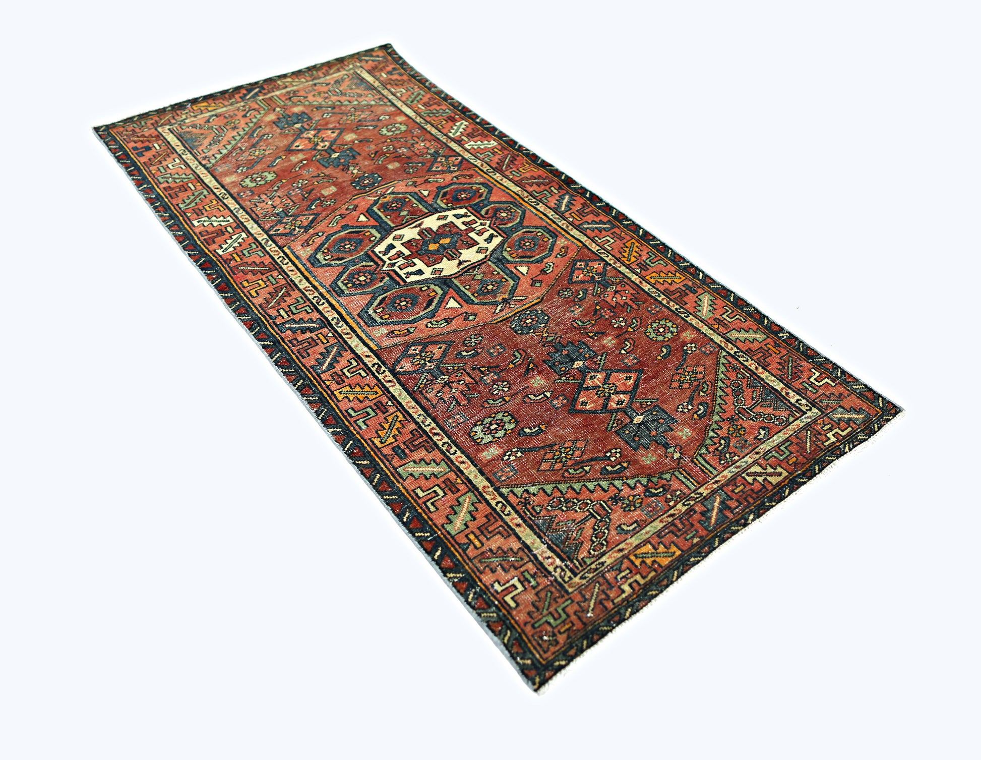A vintage handmade Persian Hamadan runner rug featuring a geometric pattern in red and blue tones.