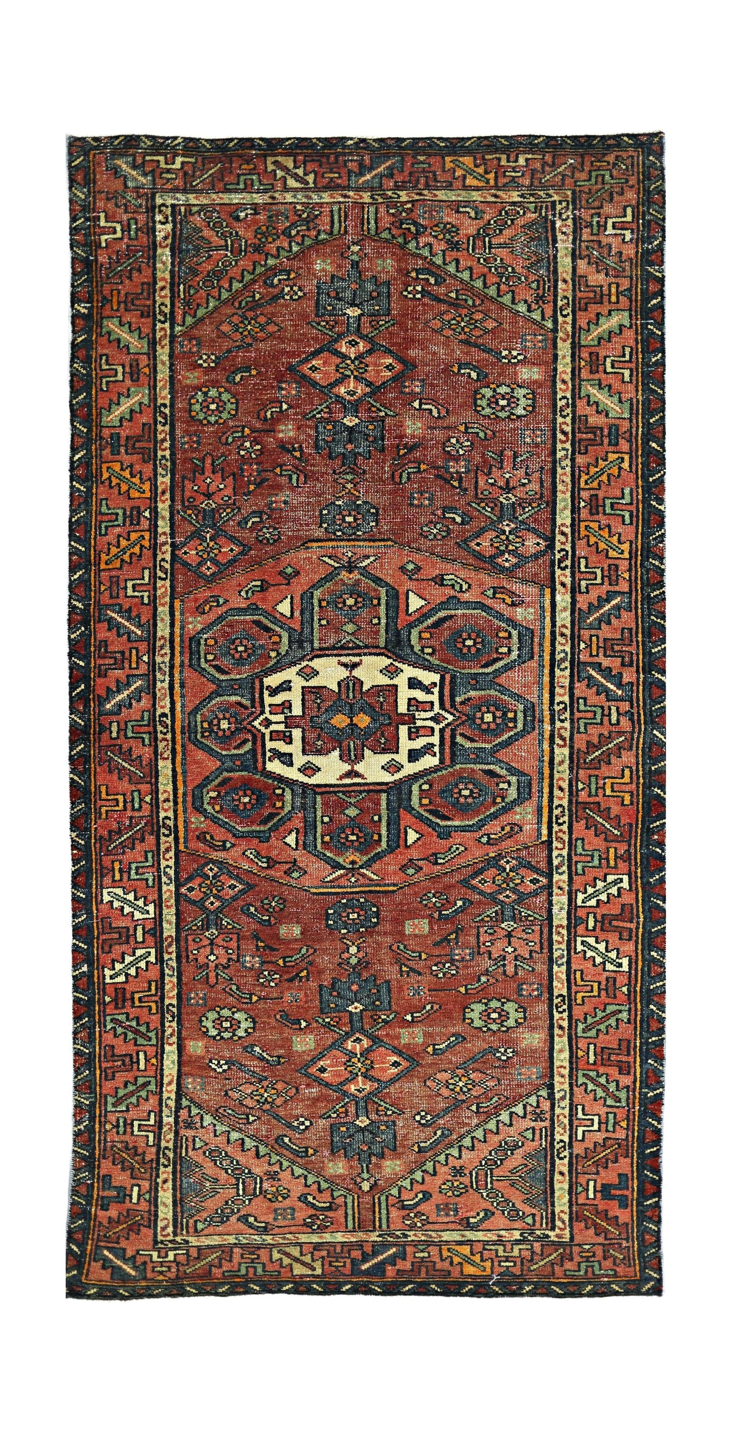 A vintage Persian Hamadan runner featuring a geometric medallion pattern in red, blue, and cream.