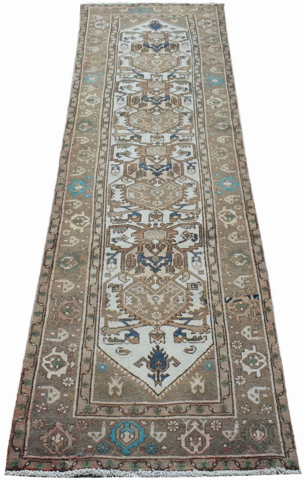 A vintage handwoven Persian Hamadan runner featuring a geometric pattern in brown and blue tones.
