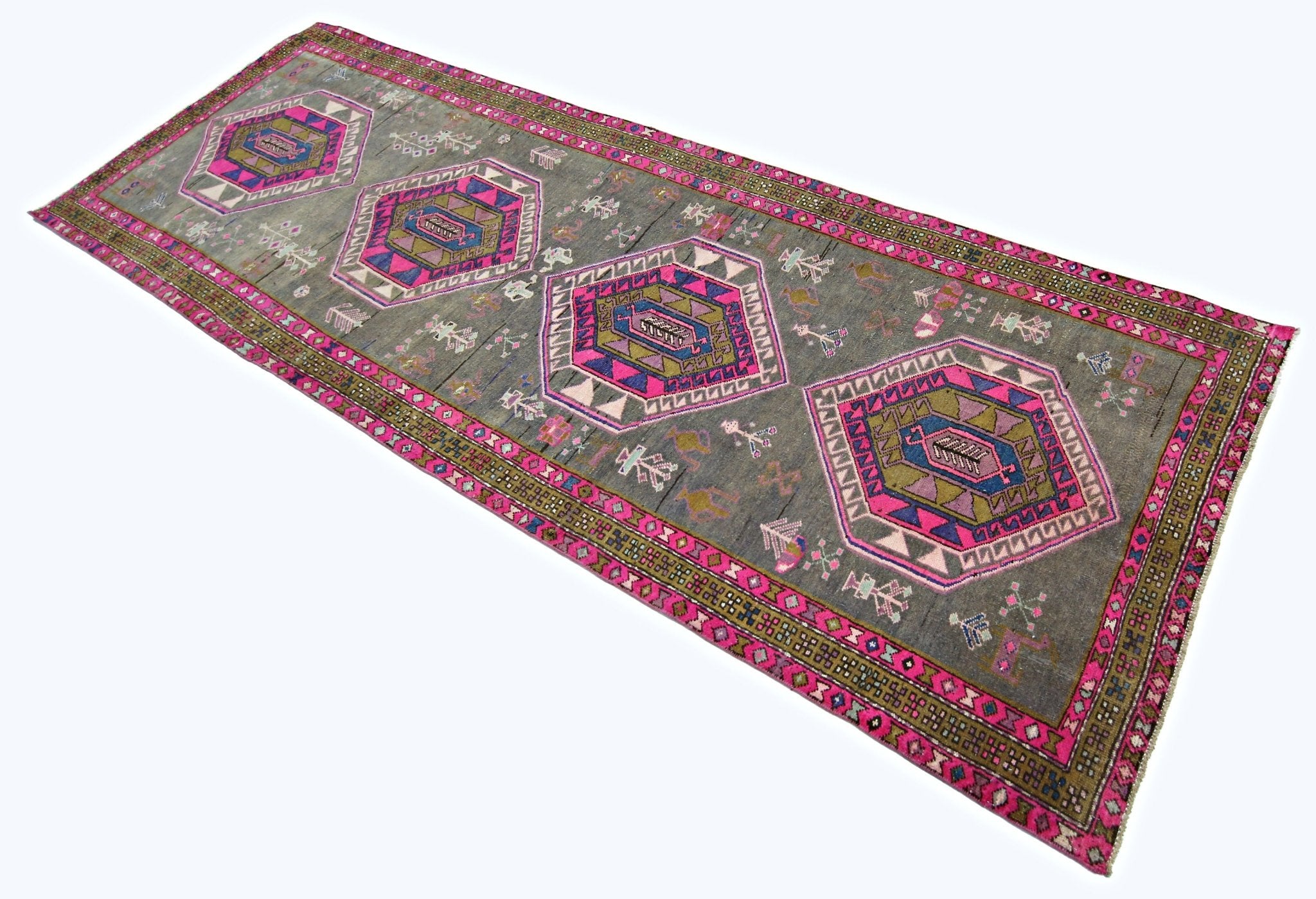 A vintage Persian Hamadan runner featuring four geometric medallions on a grey field with pink borders.