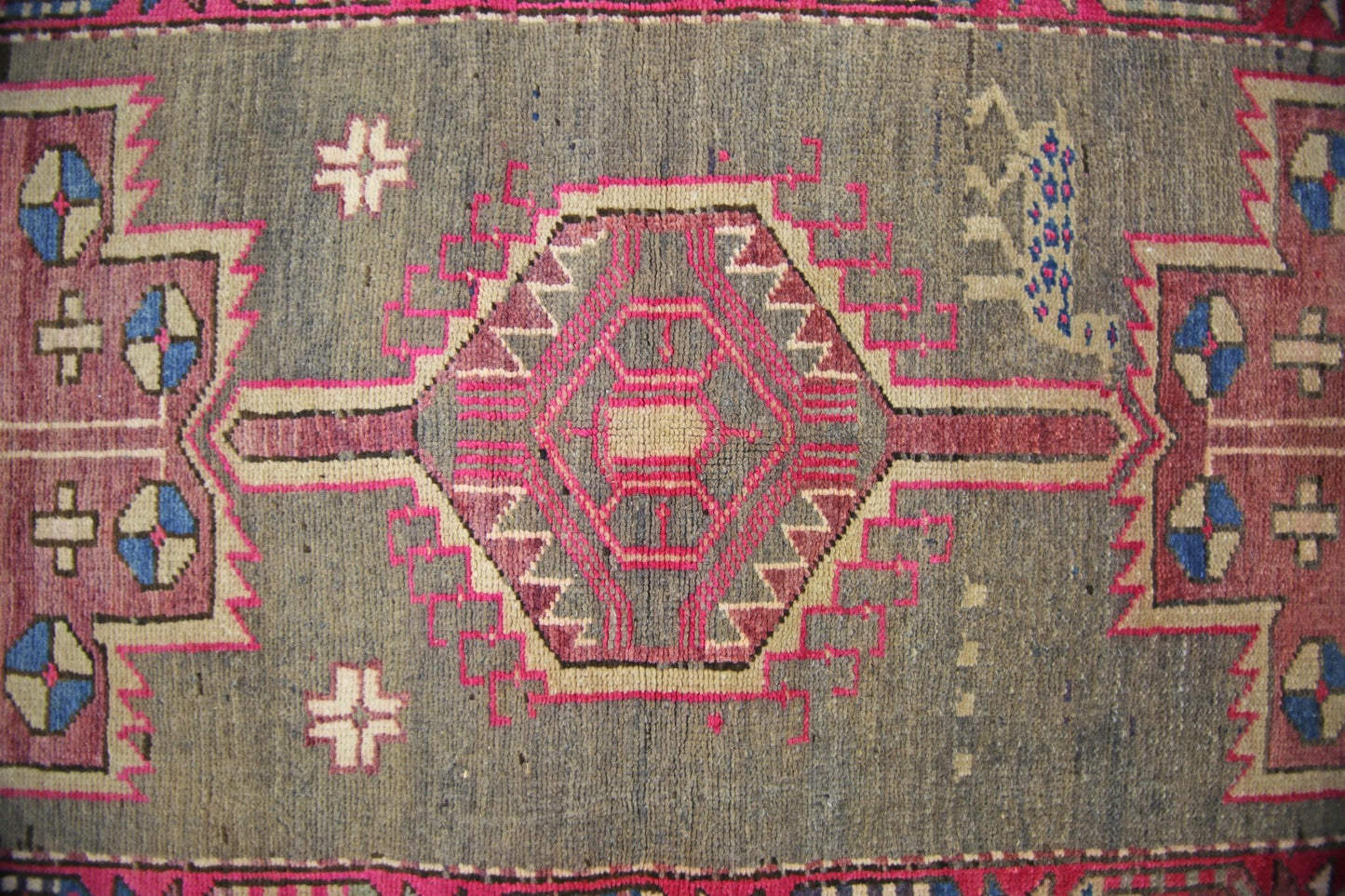 A vintage Persian Hamadan runner featuring a central geometric medallion on a grey wool field.