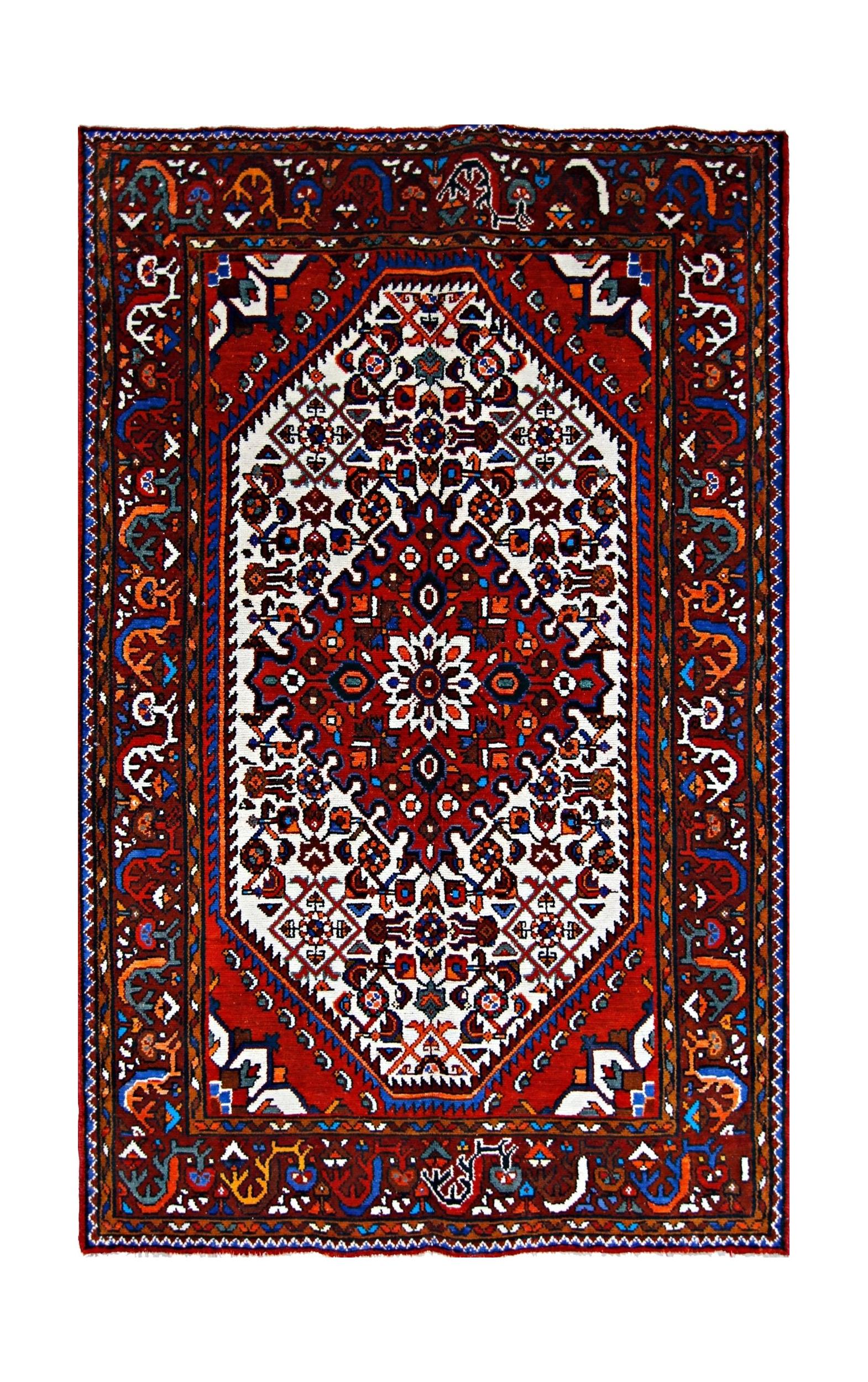 Vintage Persian Hossainabad Rug