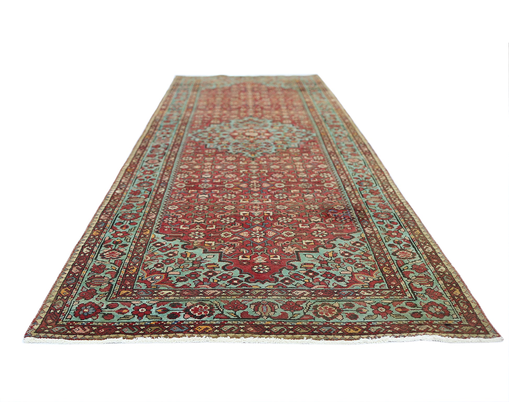 A vintage Persian Hossainabad runner rug featuring a traditional red and teal floral pattern.