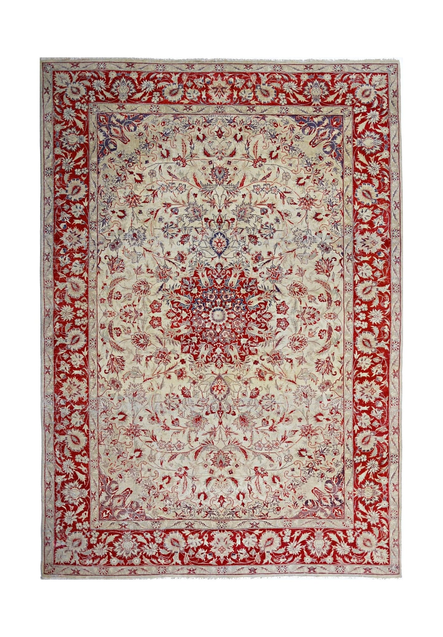 A vintage Pakistani rug featuring a central floral medallion on a cream field with a red border.