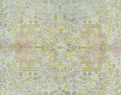 A vintage Persian Kashan rug featuring a floral pattern in soft pink, yellow, and cream tones.