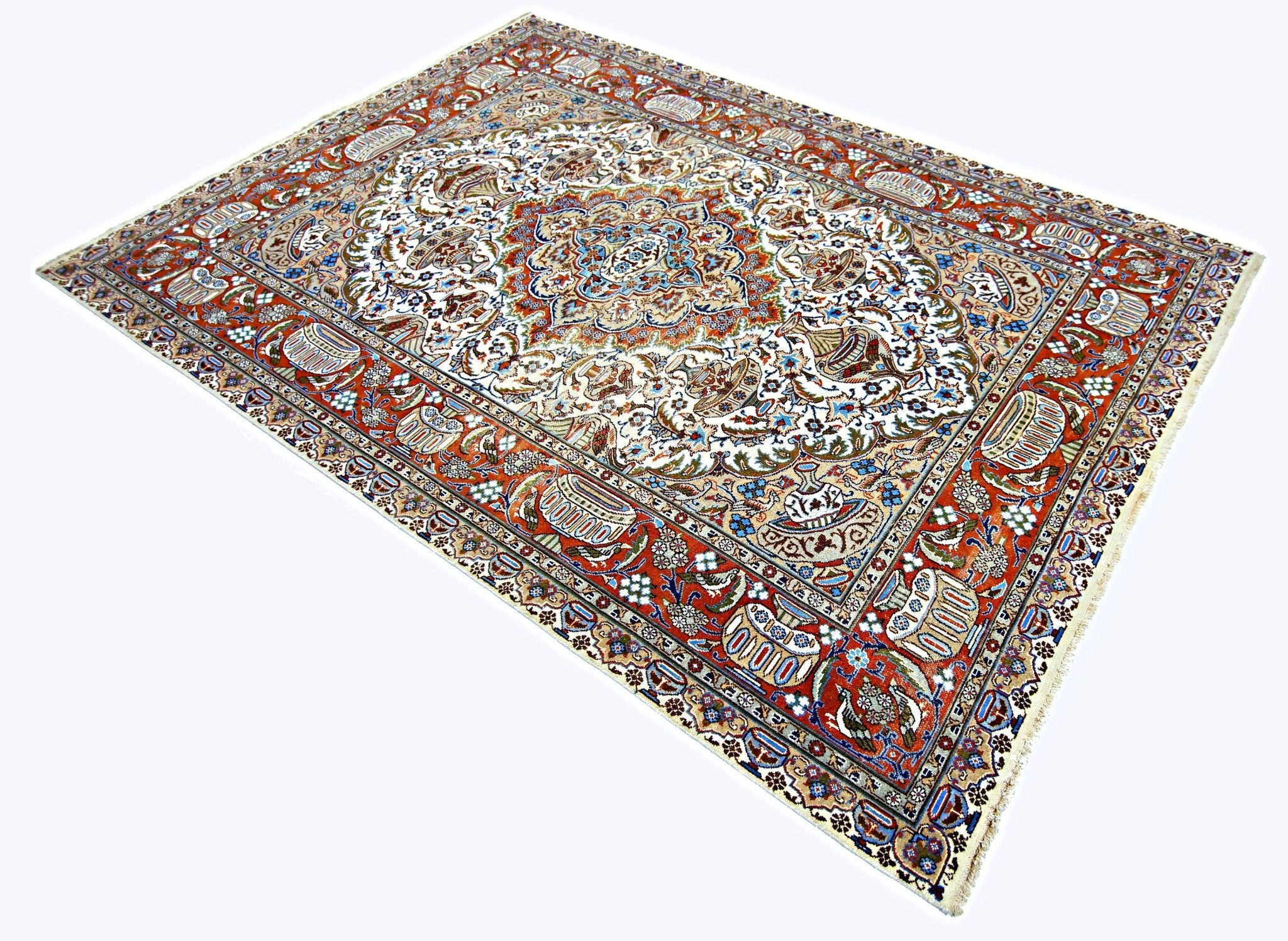 A vintage Persian Kashmar rug featuring an intricate floral medallion pattern in red and cream.