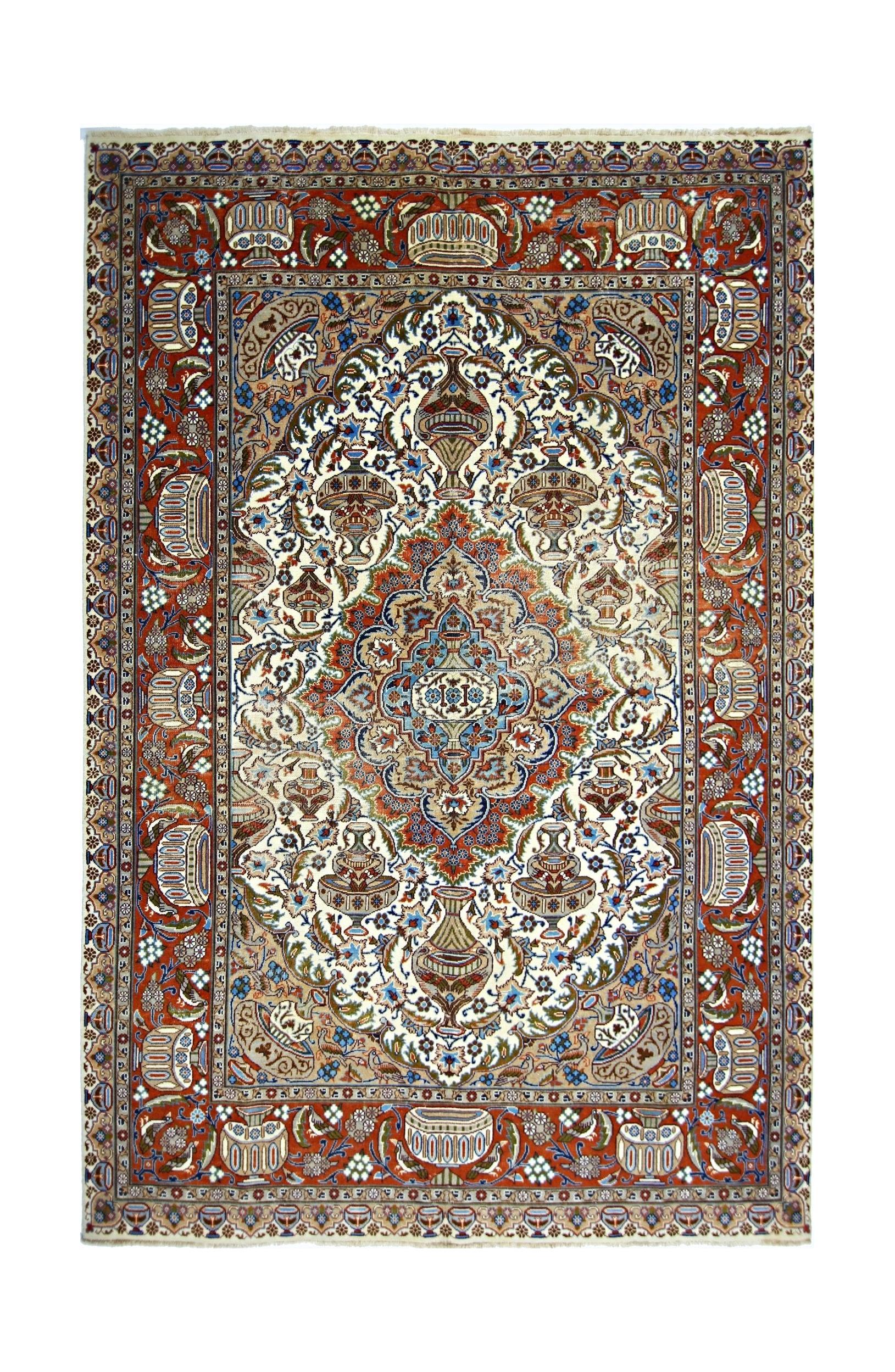 A vintage Persian Kashmar rug featuring a central medallion and intricate vase motifs on red.