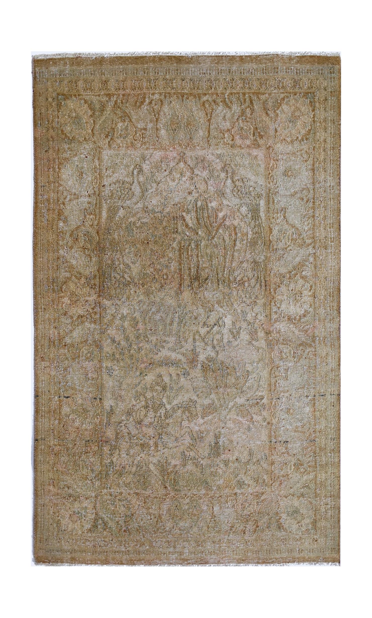 A vintage Persian Kerman rug featuring a faded floral medallion design in soft, neutral tones.