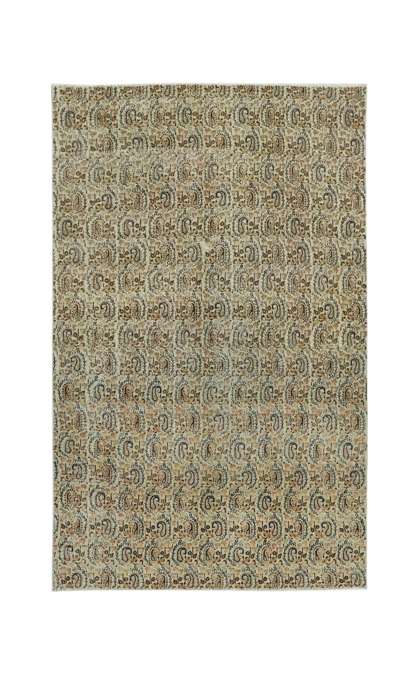 A vintage handmade Turkish rug featuring a repeating paisley pattern in muted earth tones.