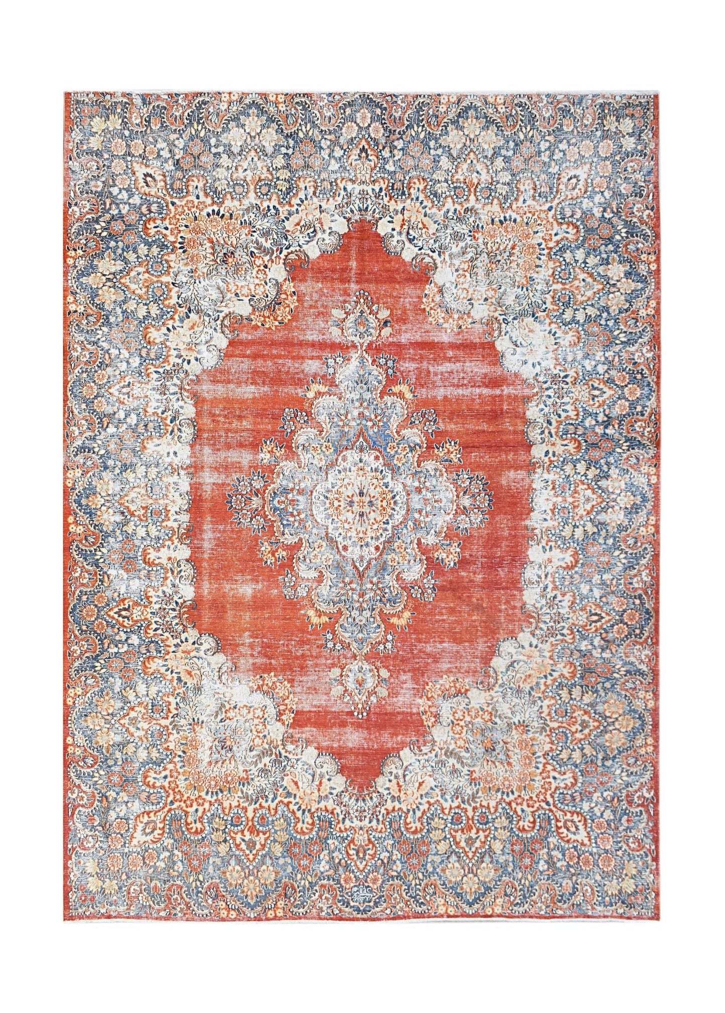A vintage Persian Kerman rug featuring a central medallion and intricate floral patterns in red.