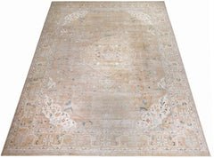 A vintage Persian Kerman rug featuring a central medallion and intricate floral patterns in beige.