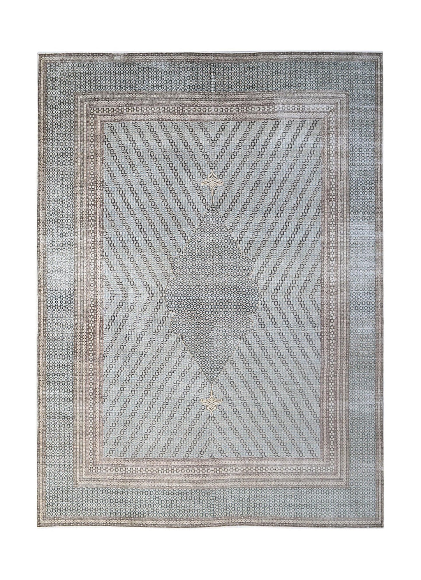 A vintage Persian Kerman rug featuring a central medallion and intricate geometric patterns.