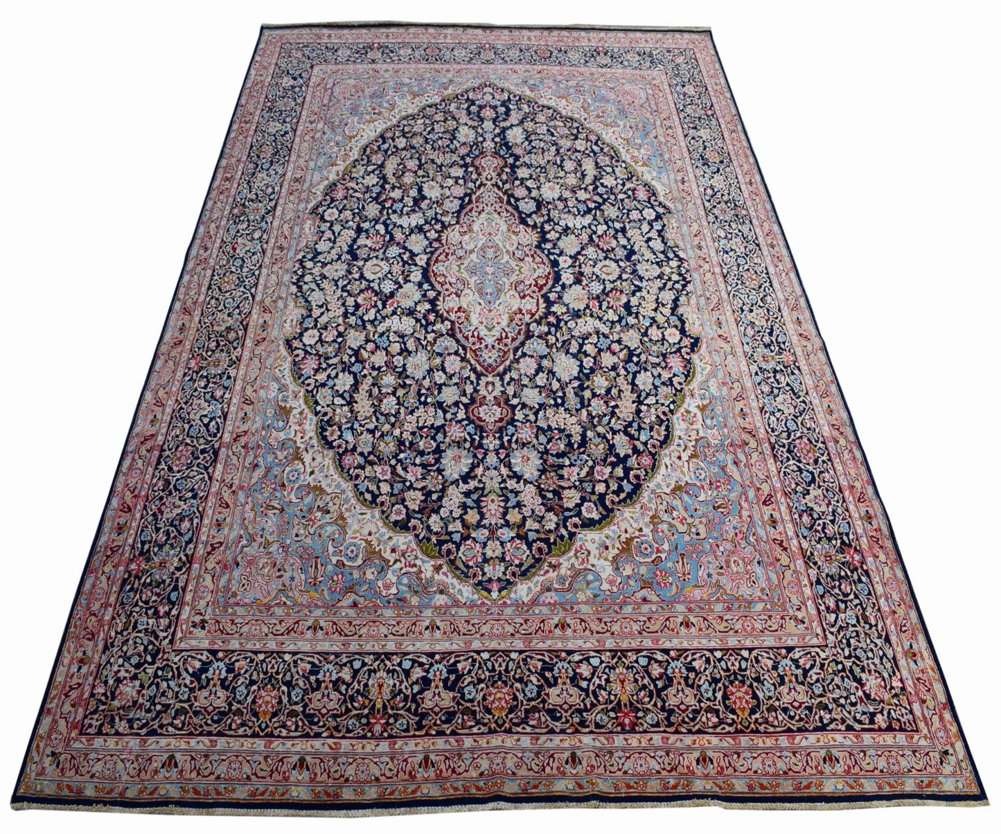 Vintage Persian Kerman rug featuring a central medallion and intricate floral patterns.