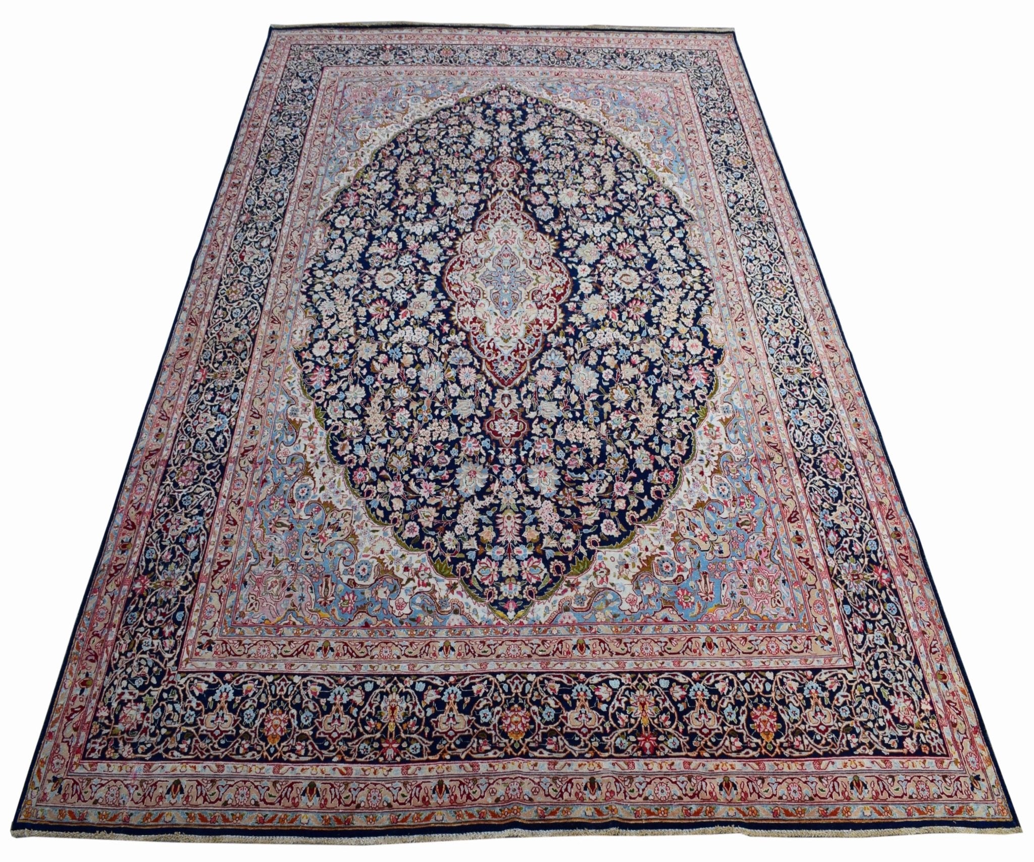 Vintage Persian Kerman rug featuring a central medallion and intricate floral patterns.