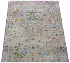 A vintage Persian Kerman runner featuring a central medallion and intricate floral patterns.