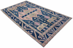 A vintage Persian Koliai rug featuring a geometric pattern in shades of blue, pink, and tan.