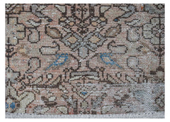 A vintage handwoven Persian Hamadan runner featuring intricate geometric patterns in muted tones.