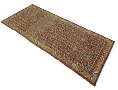 A vintage Persian Hamadan runner rug featuring a detailed geometric pattern in rich, earthy tones.