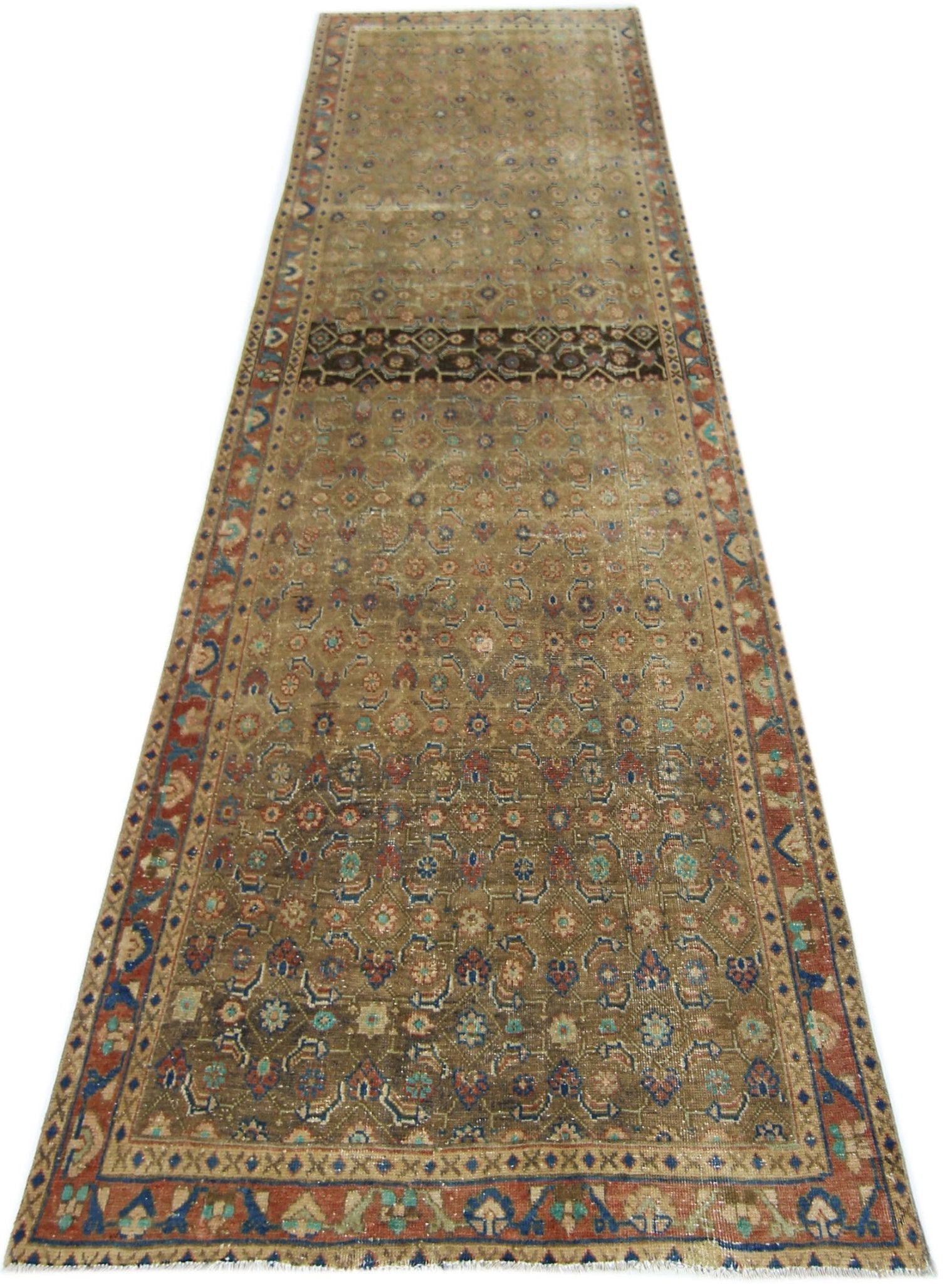 A vintage handmade Persian Hamadan runner featuring a traditional floral pattern in earthy tones.
