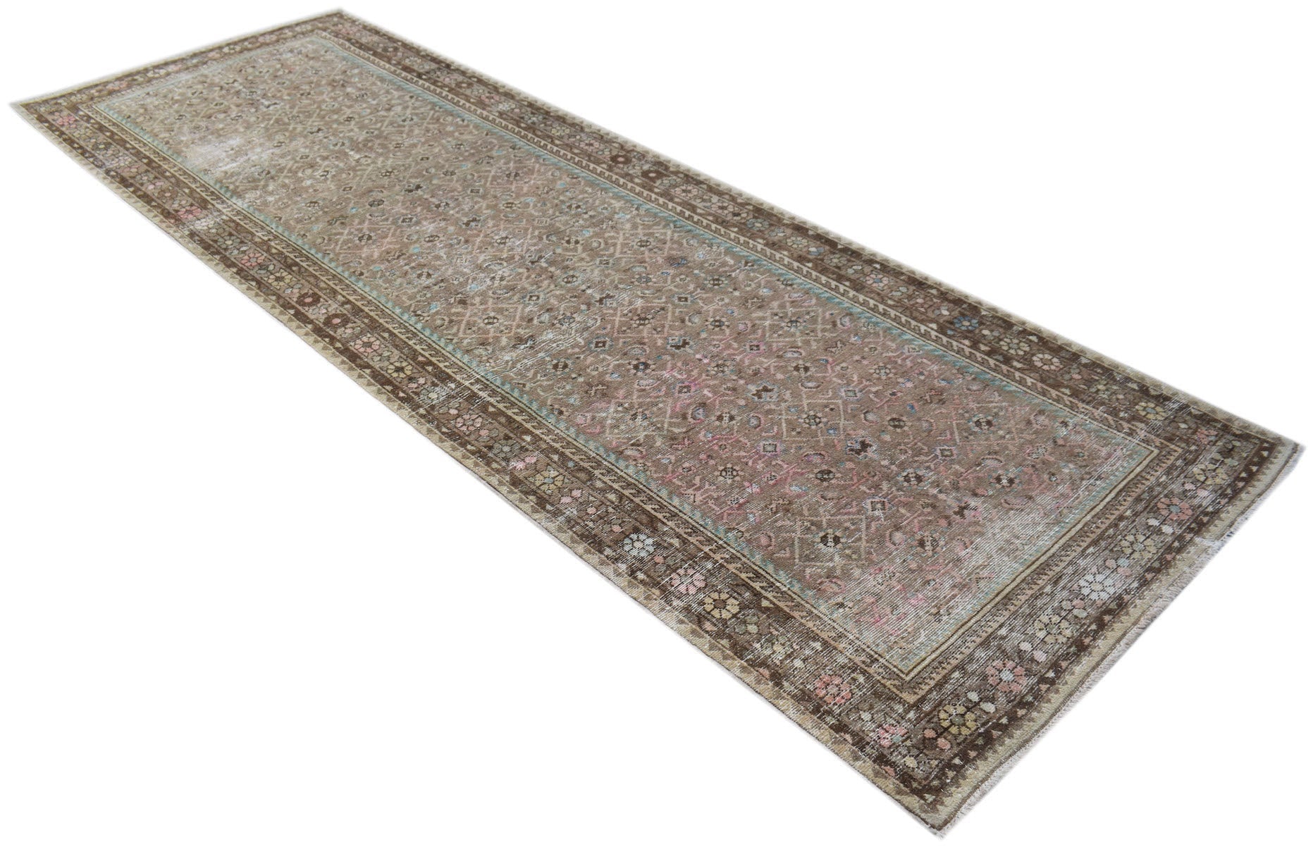 A vintage Persian Hamadan runner rug featuring a faded brown and pink geometric pattern.