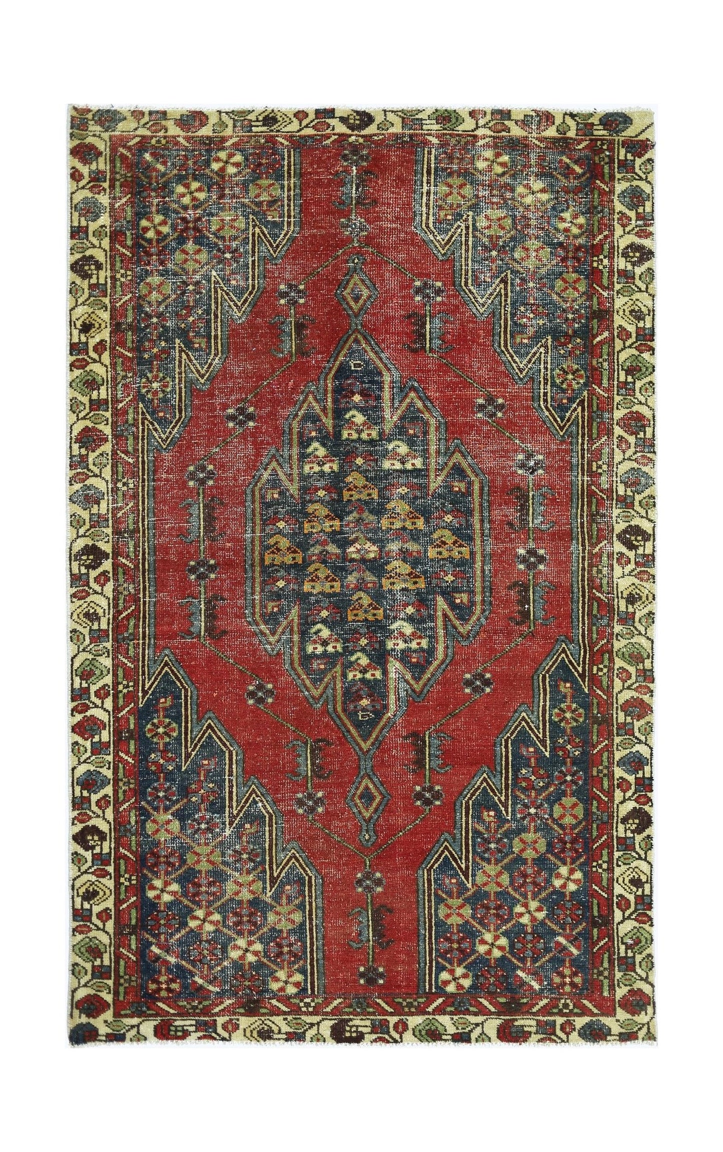A vintage Persian Mazlaghan rug featuring a central geometric medallion on a red field.