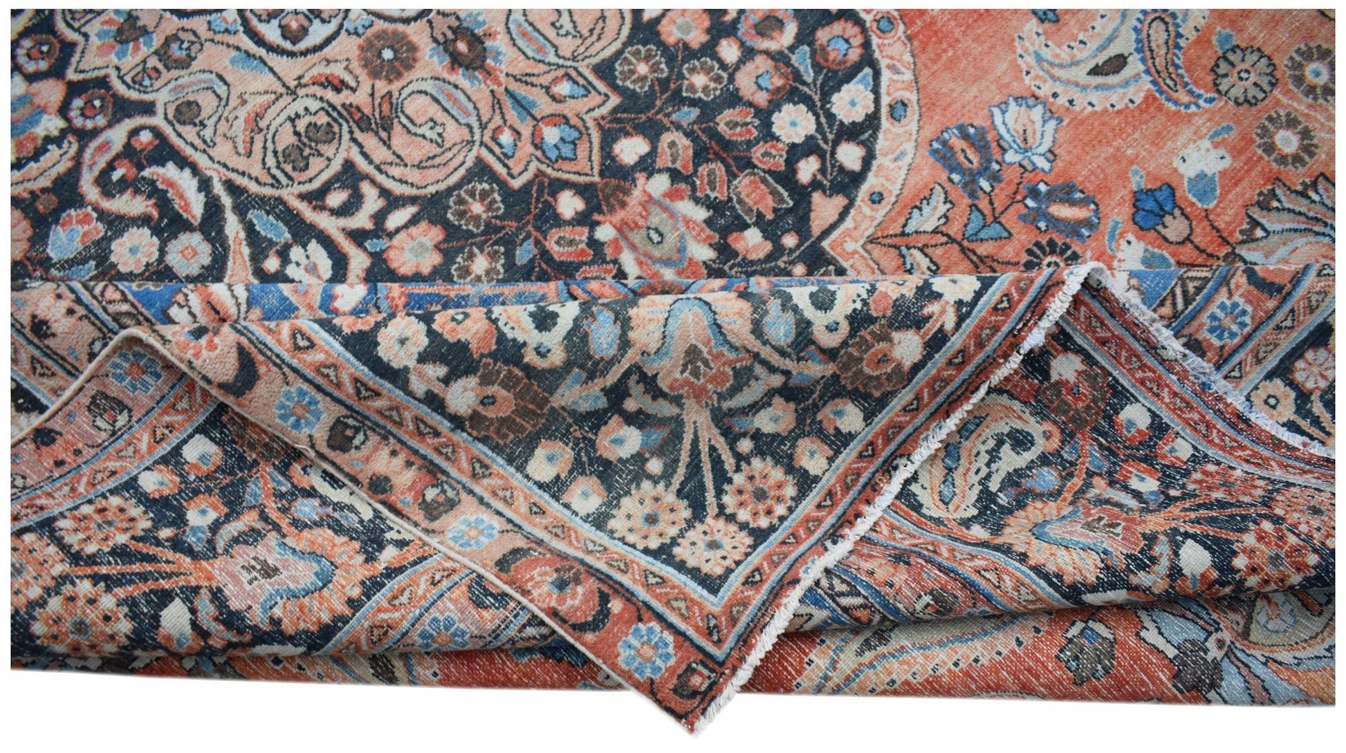 A vintage Persian Moud rug featuring intricate floral patterns in shades of orange and blue.