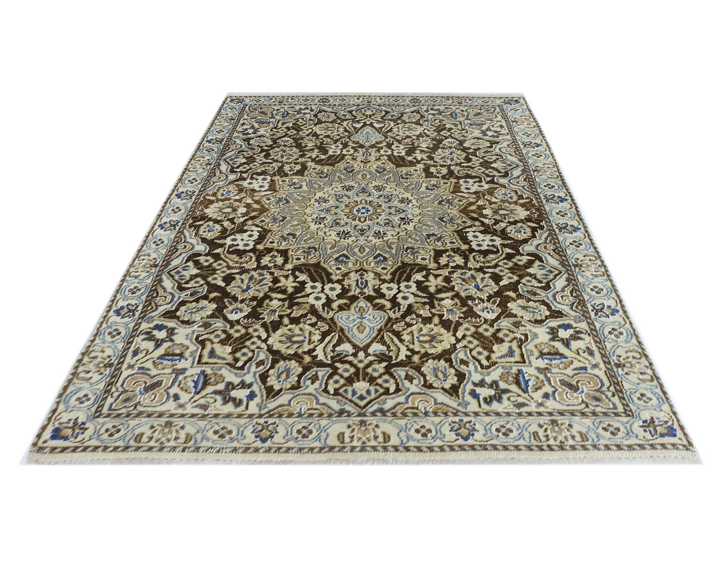 A vintage Persian Nain rug featuring an intricate floral medallion pattern in brown and cream.