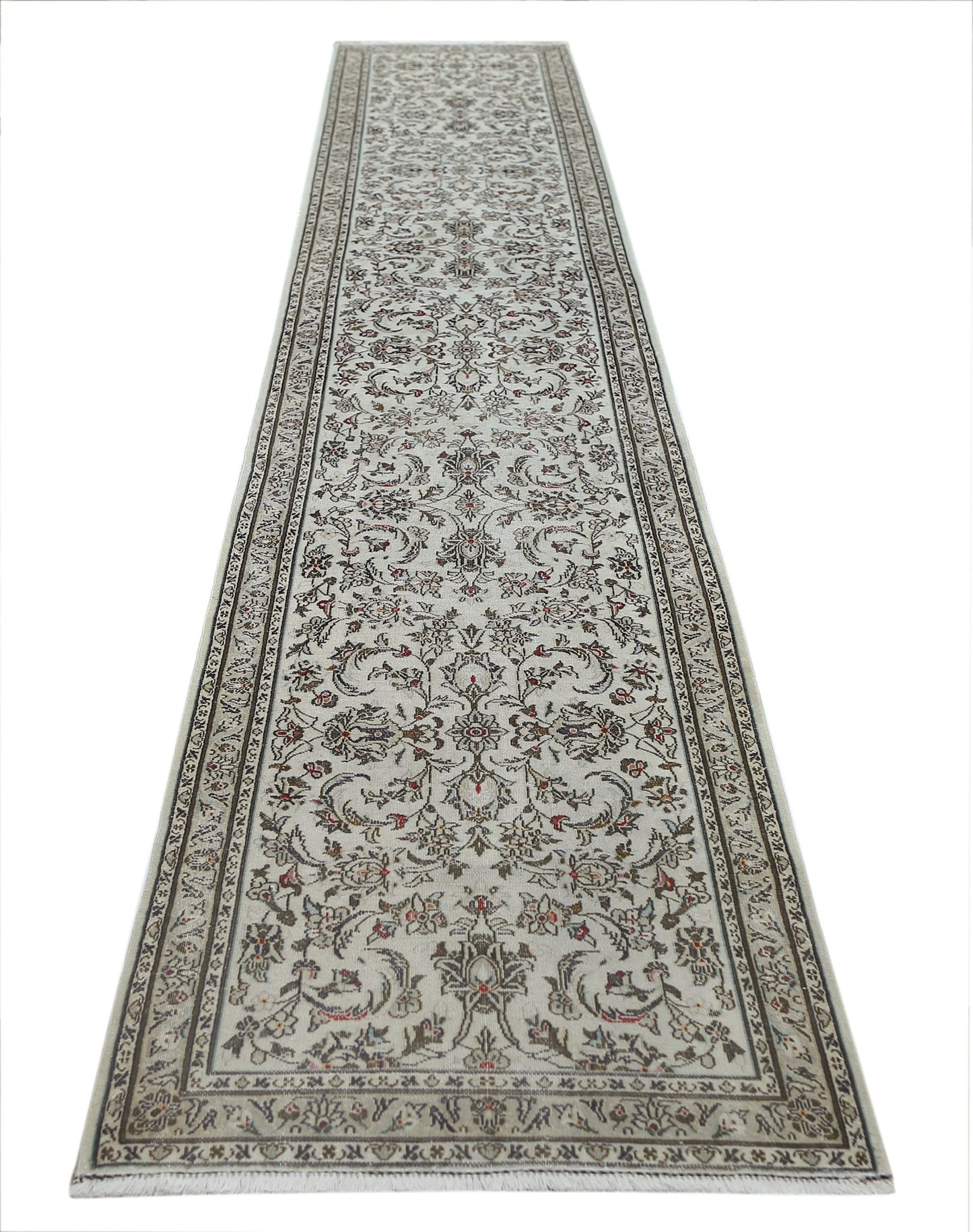 A vintage Persian Nain runner featuring intricate floral patterns in neutral tones.