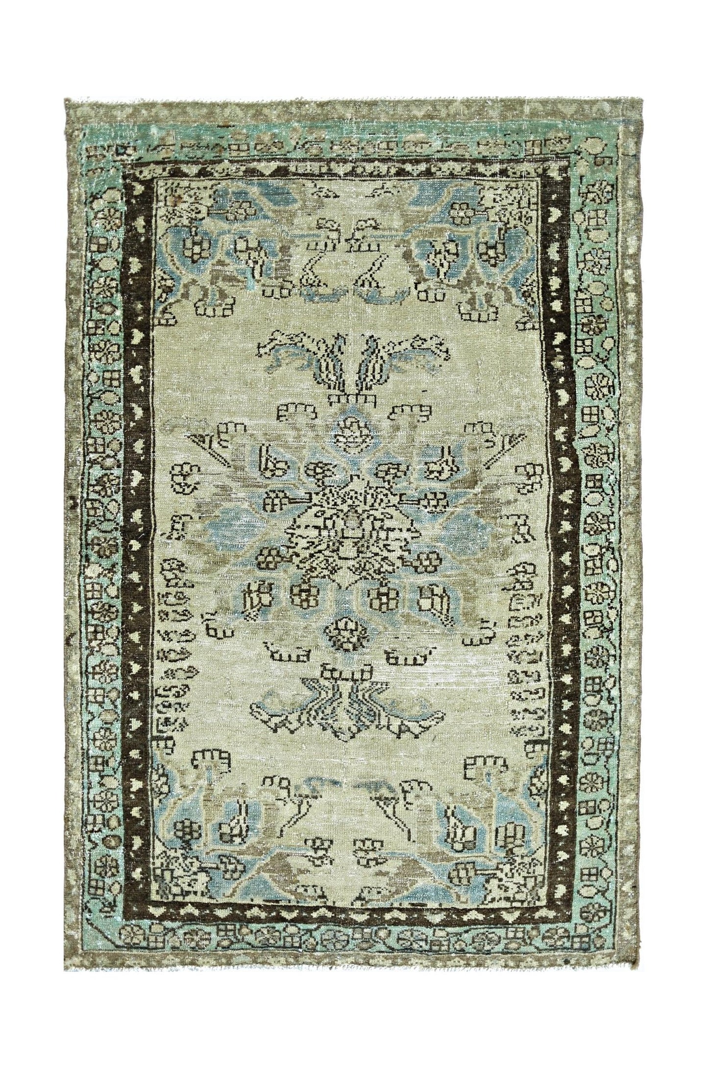A vintage handmade Persian rug featuring a central floral medallion in blue and beige tones.