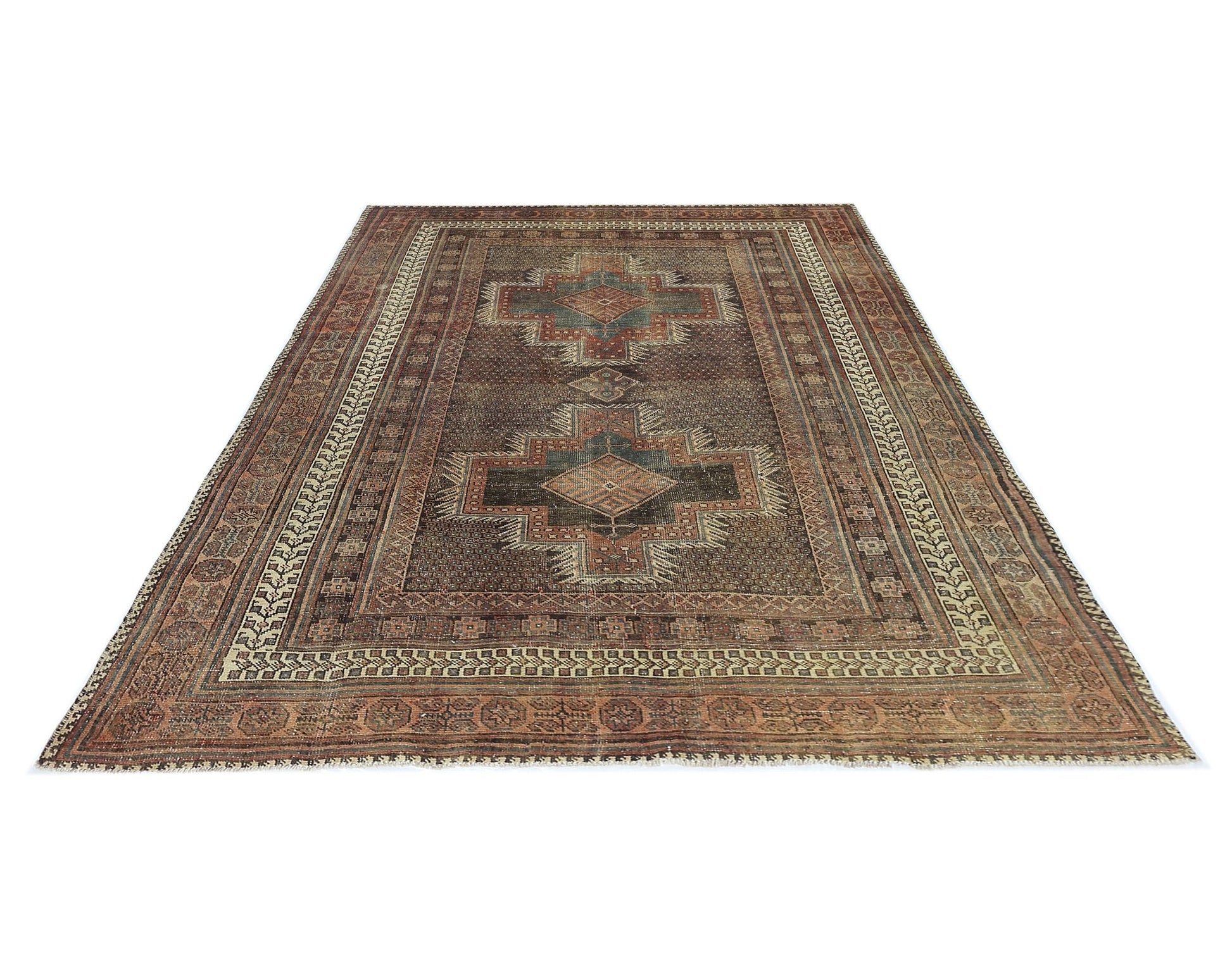 A vintage Persian rug featuring a dark brown field with two central geometric medallions.